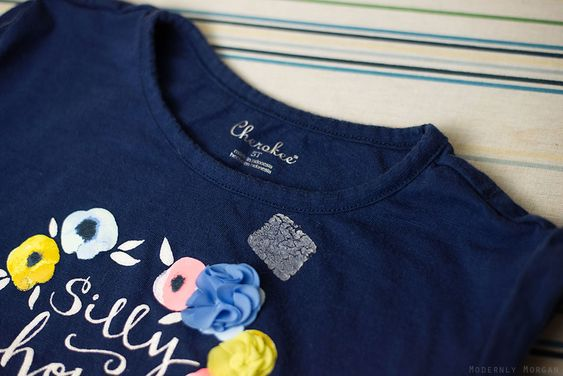 remove sticker residue from clothes